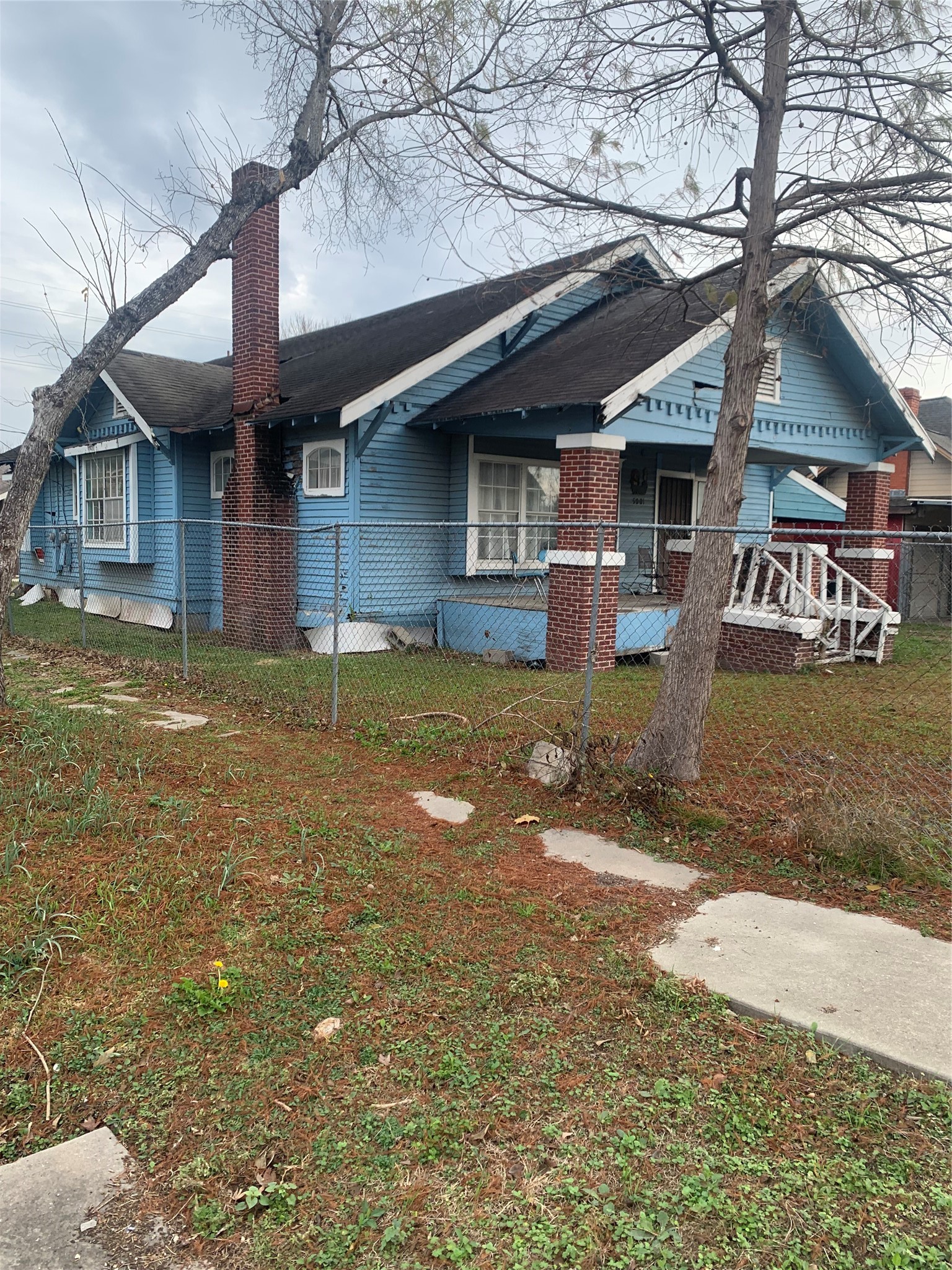 5001 Sherman Street Houston, TX 77011 - Photo 1 of 23 a view of a house with a patio