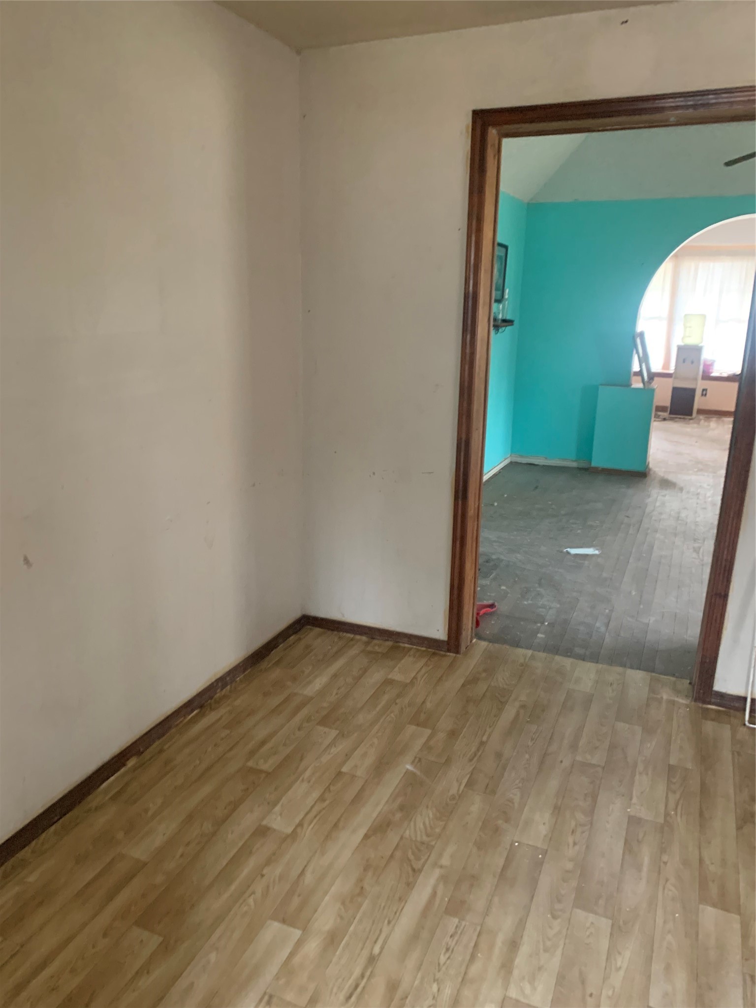 5001 Sherman Street Houston, TX 77011 - Photo 14 of 23 a view of a livingroom with wooden floor and a potted plant