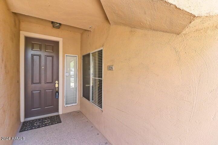 8245 East Bell Road, Unit 128 Scottsdale, AZ 85260 - Photo 6 of 26 Front Door