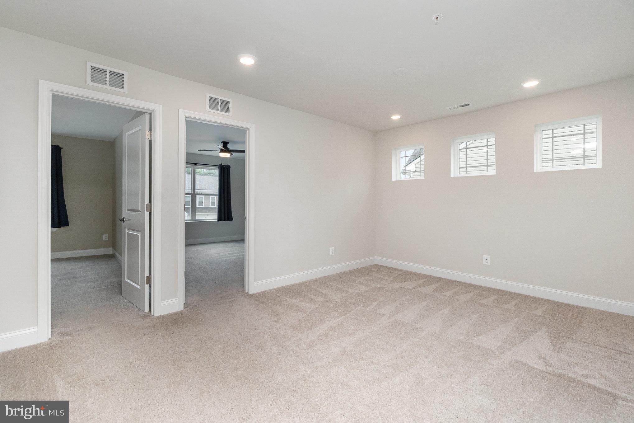 1126 Up And Over Lane Aberdeen, MD 21001 - Photo 20 of 46 an empty room with windows and entrance