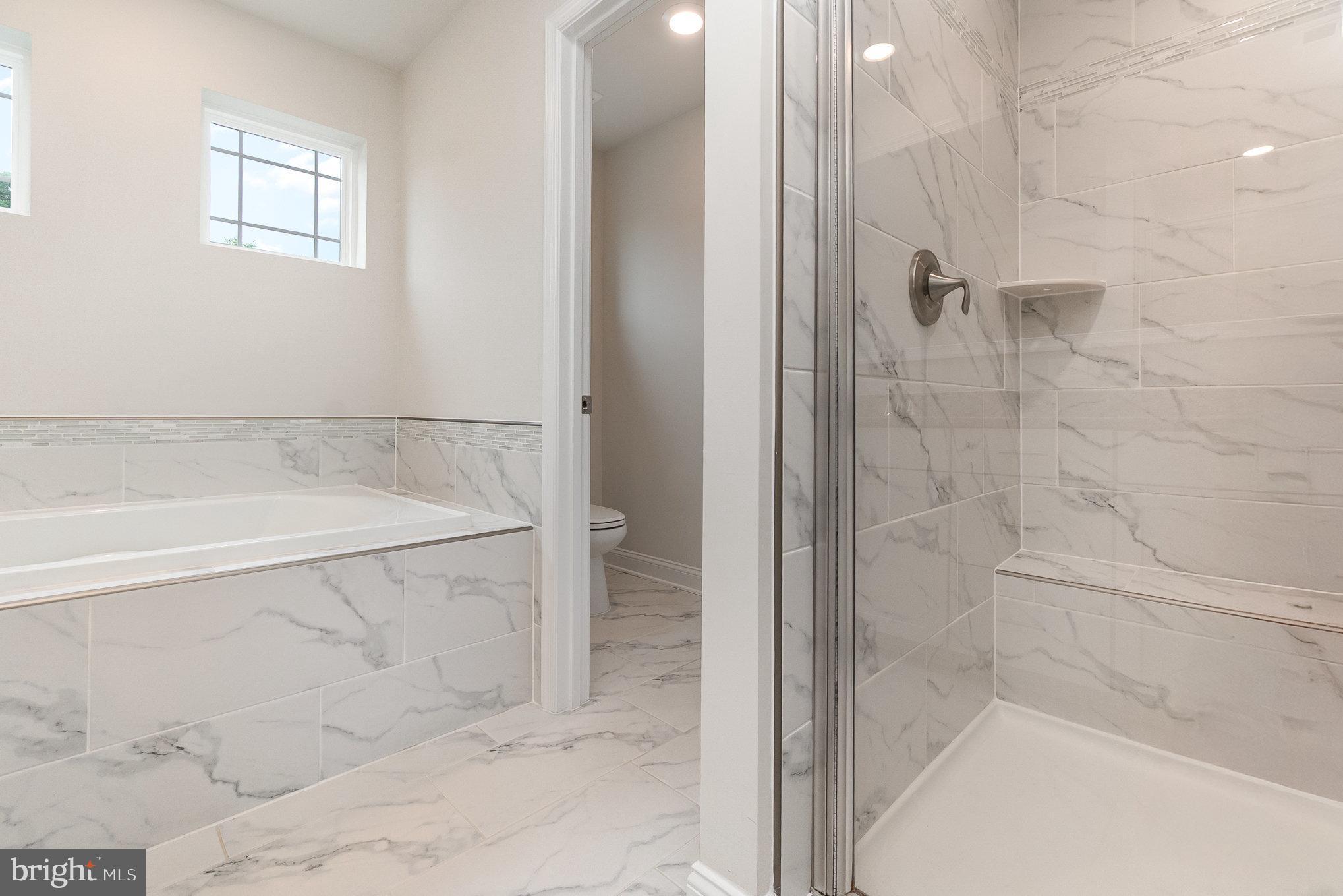 1126 Up And Over Lane Aberdeen, MD 21001 - Photo 26 of 46 a bathroom with a bathtub and shower