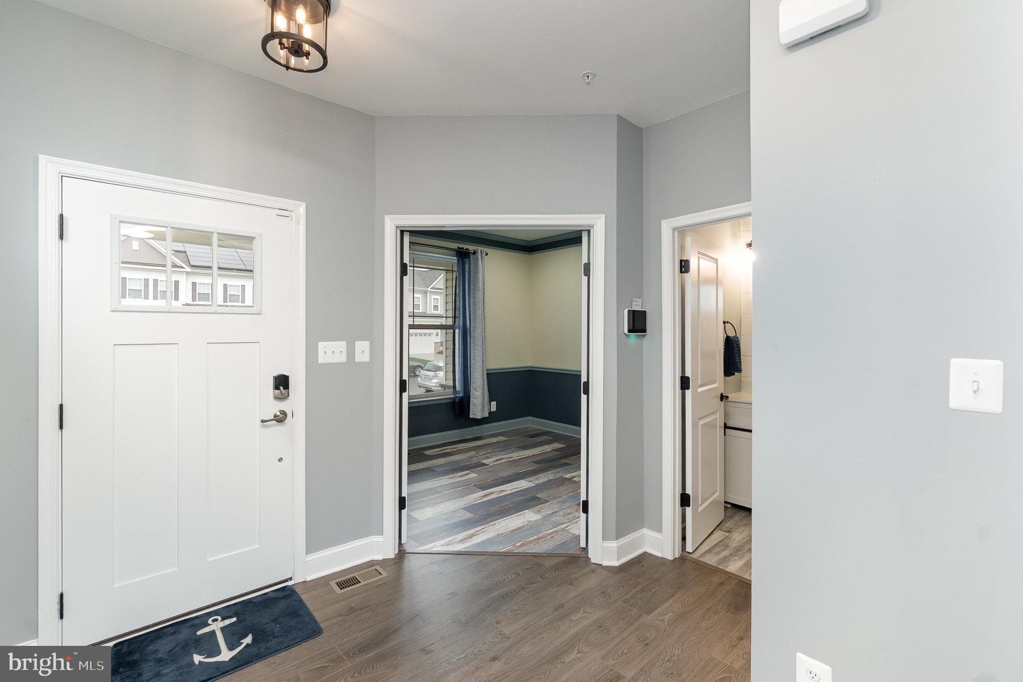 1126 Up And Over Lane Aberdeen, MD 21001 - Photo 3 of 46 a view of a hallway with wooden floor