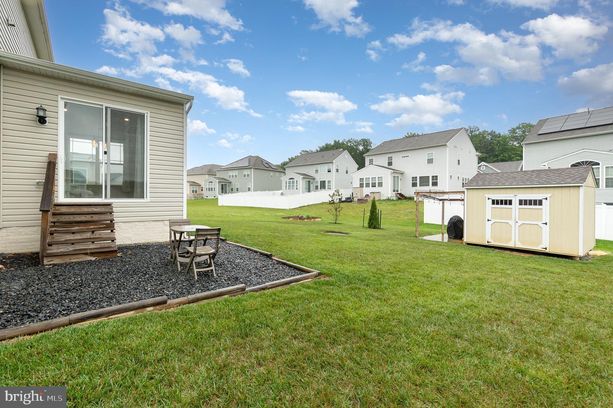 1126 Up And Over Lane Aberdeen, MD 21001 - Photo 43 of 46 a front view of a house with garden