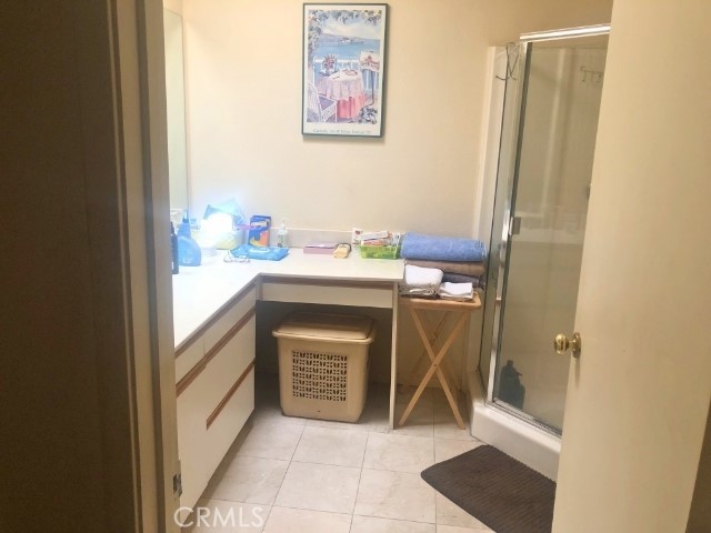 200 East Racquet Club Road, Unit 19 Palm Springs, CA 92262 - Photo 9 of 21 a utility room with a sink dryer and washer