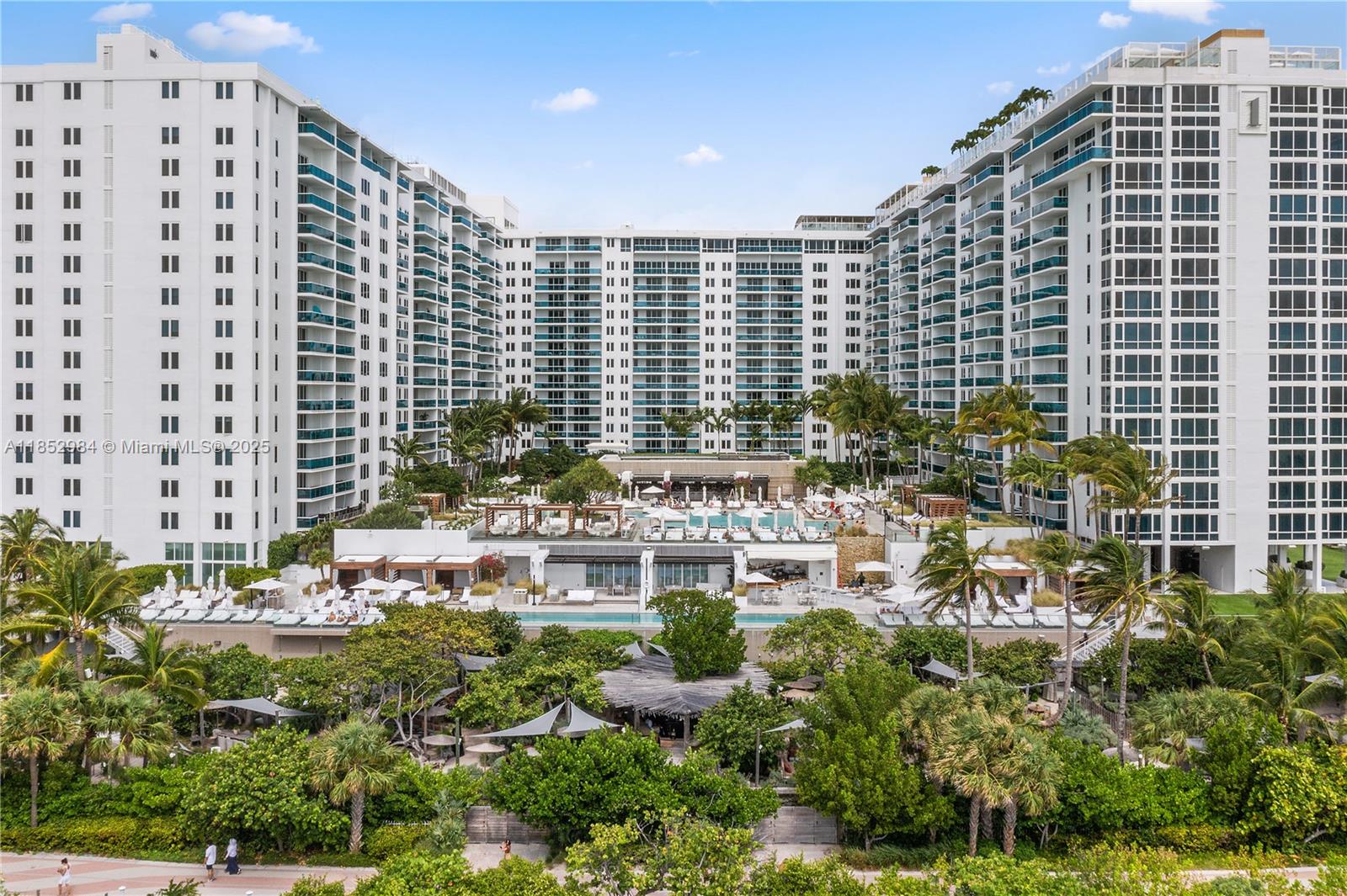 2301 Collins Avenue, Unit 523 Miami Beach, FL 33139 - Photo 2 of 49 a view of building with outdoor space and garden