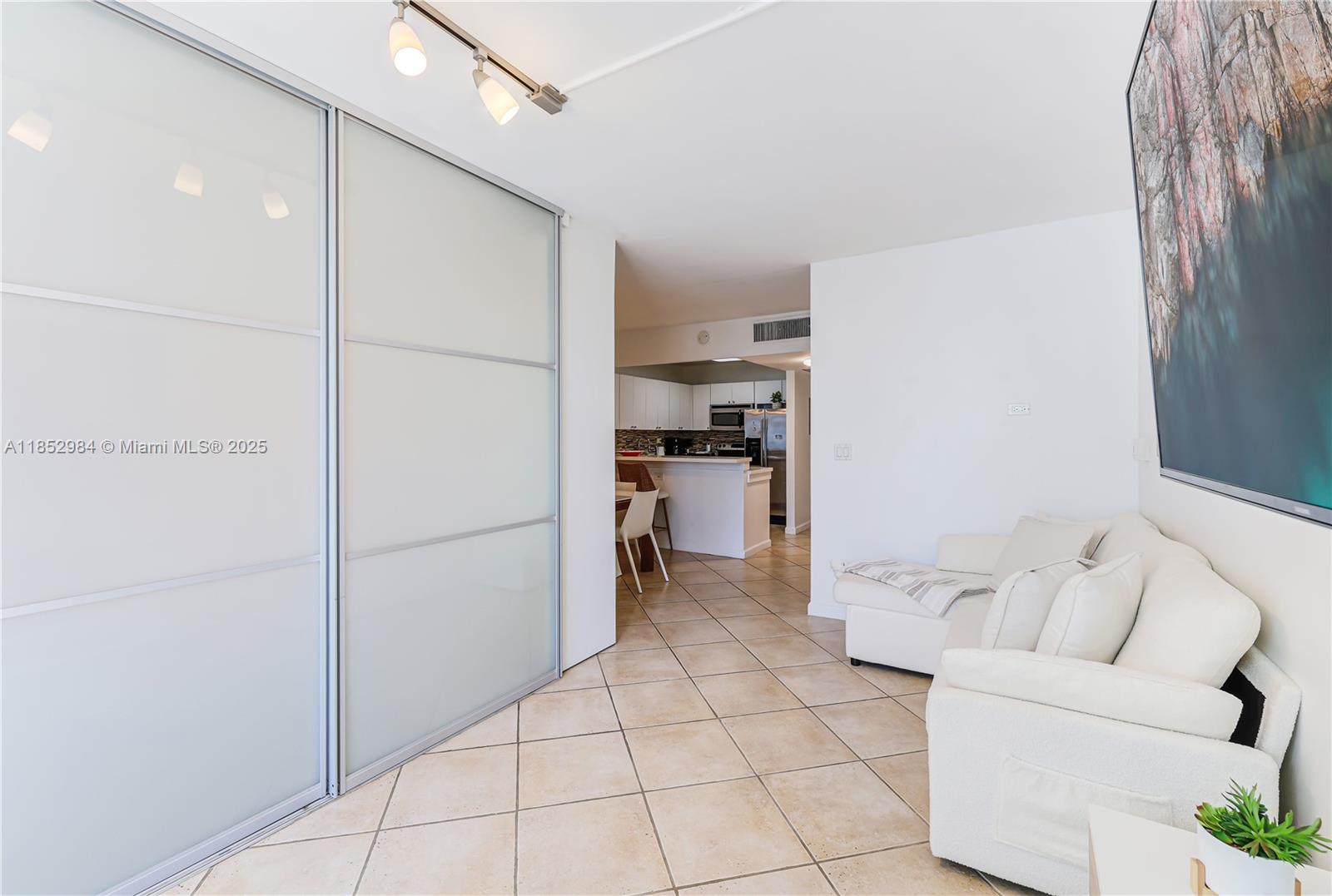 2301 Collins Avenue, Unit 523 Miami Beach, FL 33139 - Photo 21 of 49 a living room with furniture