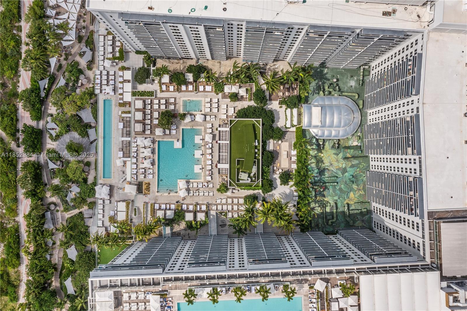 2301 Collins Avenue, Unit 523 Miami Beach, FL 33139 - Photo 35 of 49 a front view of a house with a yard