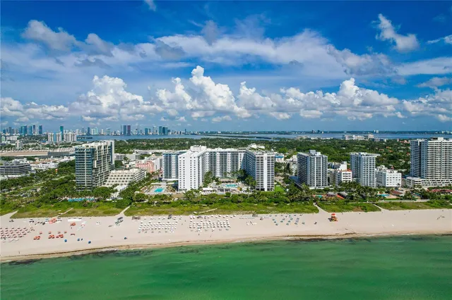 a view of a lake with a house in the background