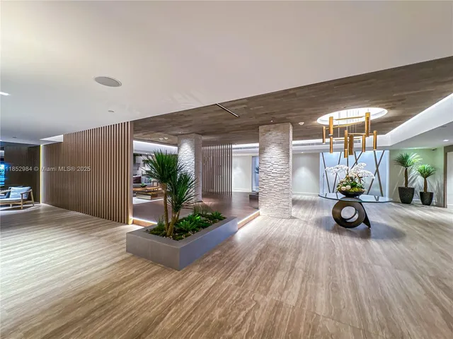 a view of a house with porch and wooden floor