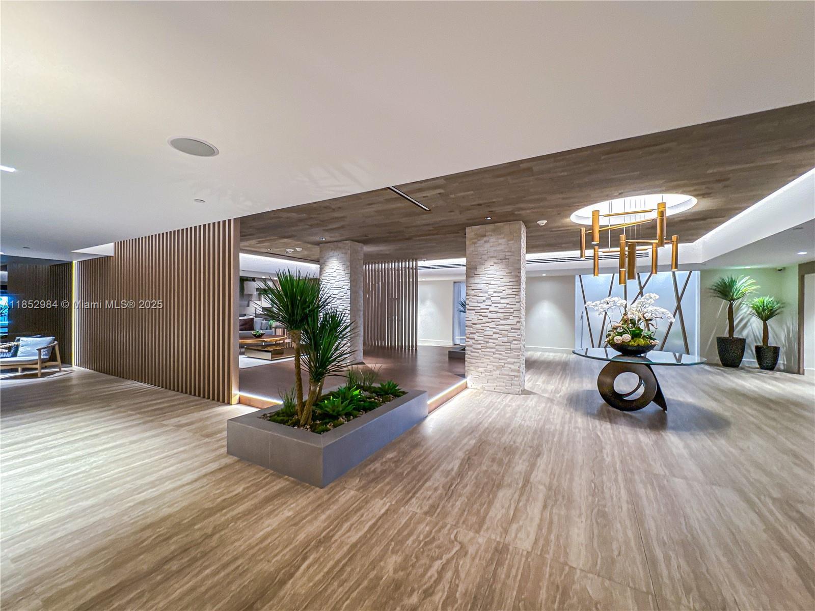 2301 Collins Avenue, Unit 523 Miami Beach, FL 33139 - Photo 6 of 49 a view of a house with porch and wooden floor