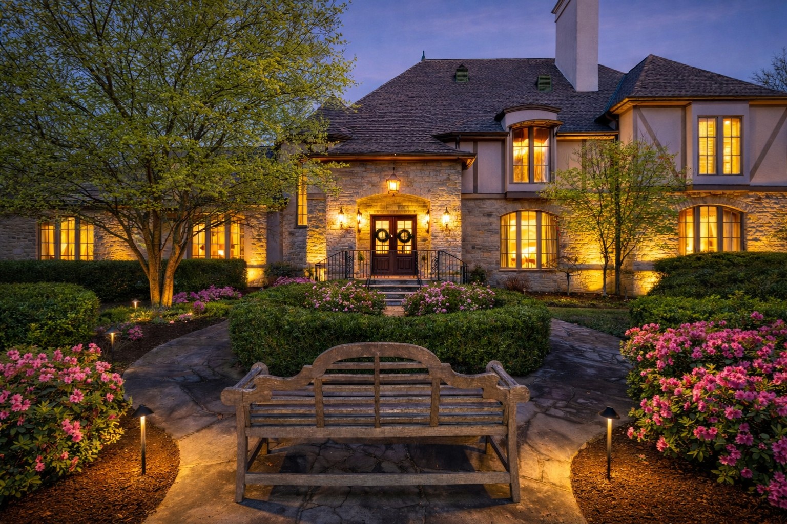 a front view of a house with a yard