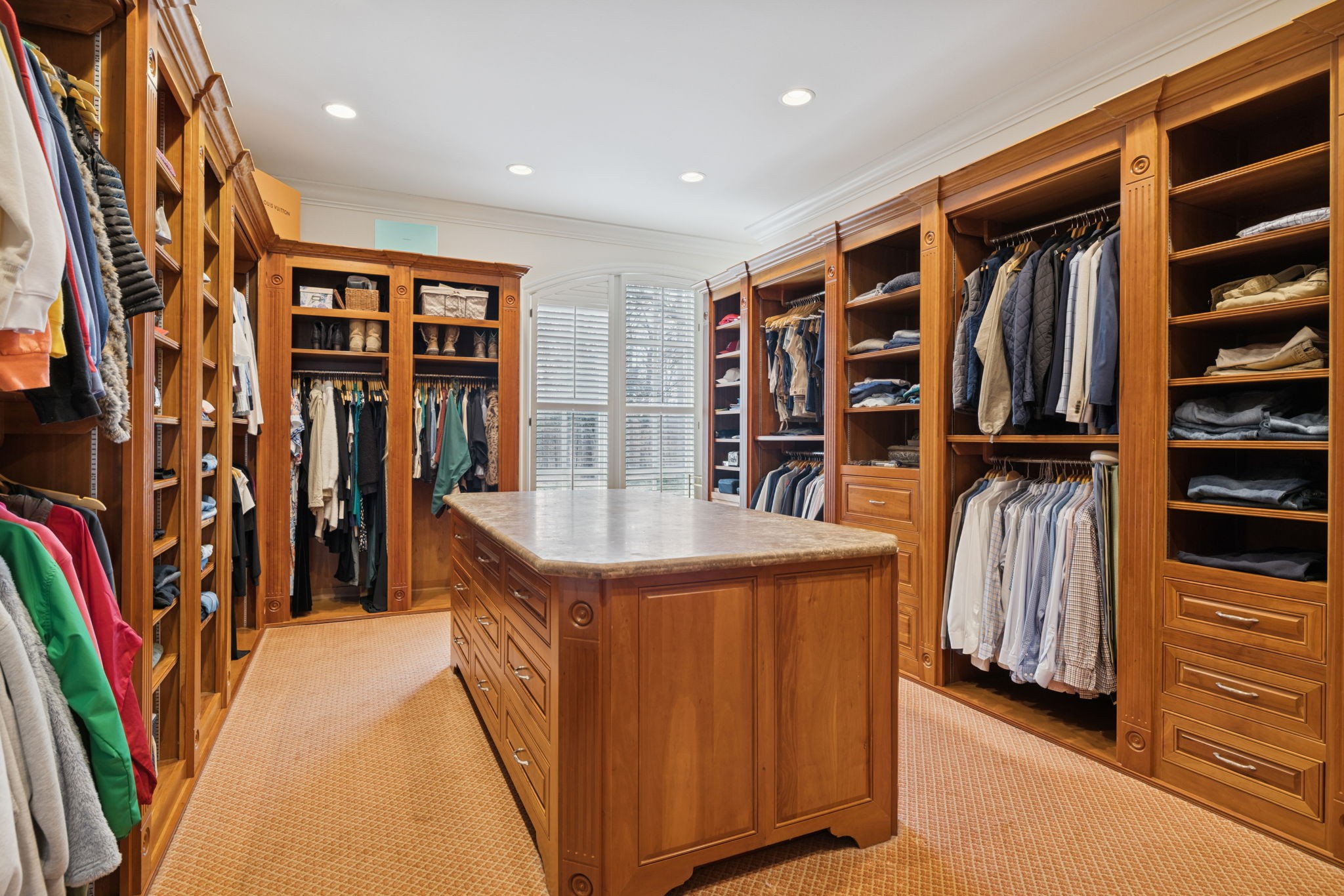 225 Lake Hills Road Tullahoma, TN 37388 - Photo 44 of 82 a view of walk in closet with clothes and shoes