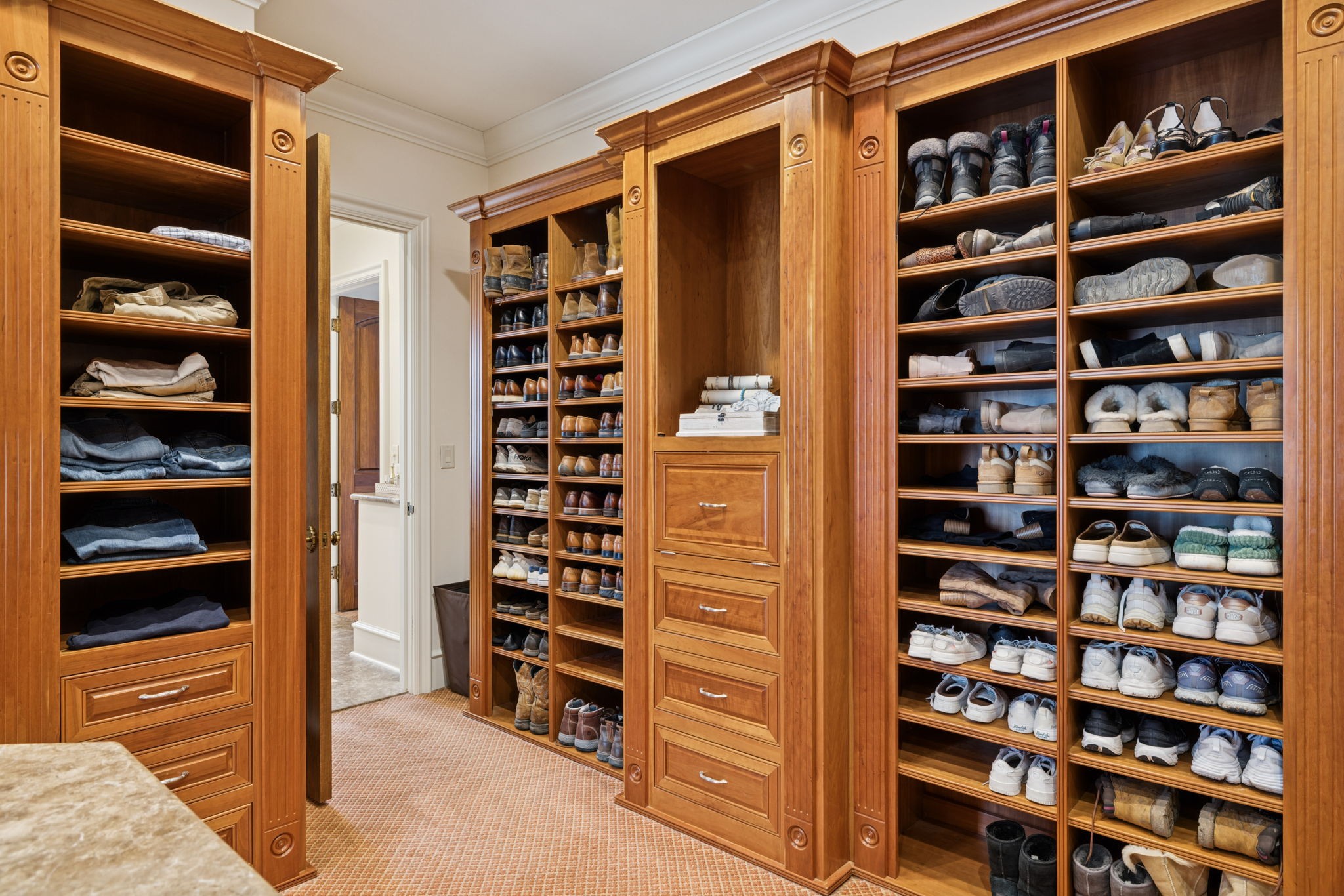 225 Lake Hills Road Tullahoma, TN 37388 - Photo 46 of 82 a view of walk in closet with clothes and shoes