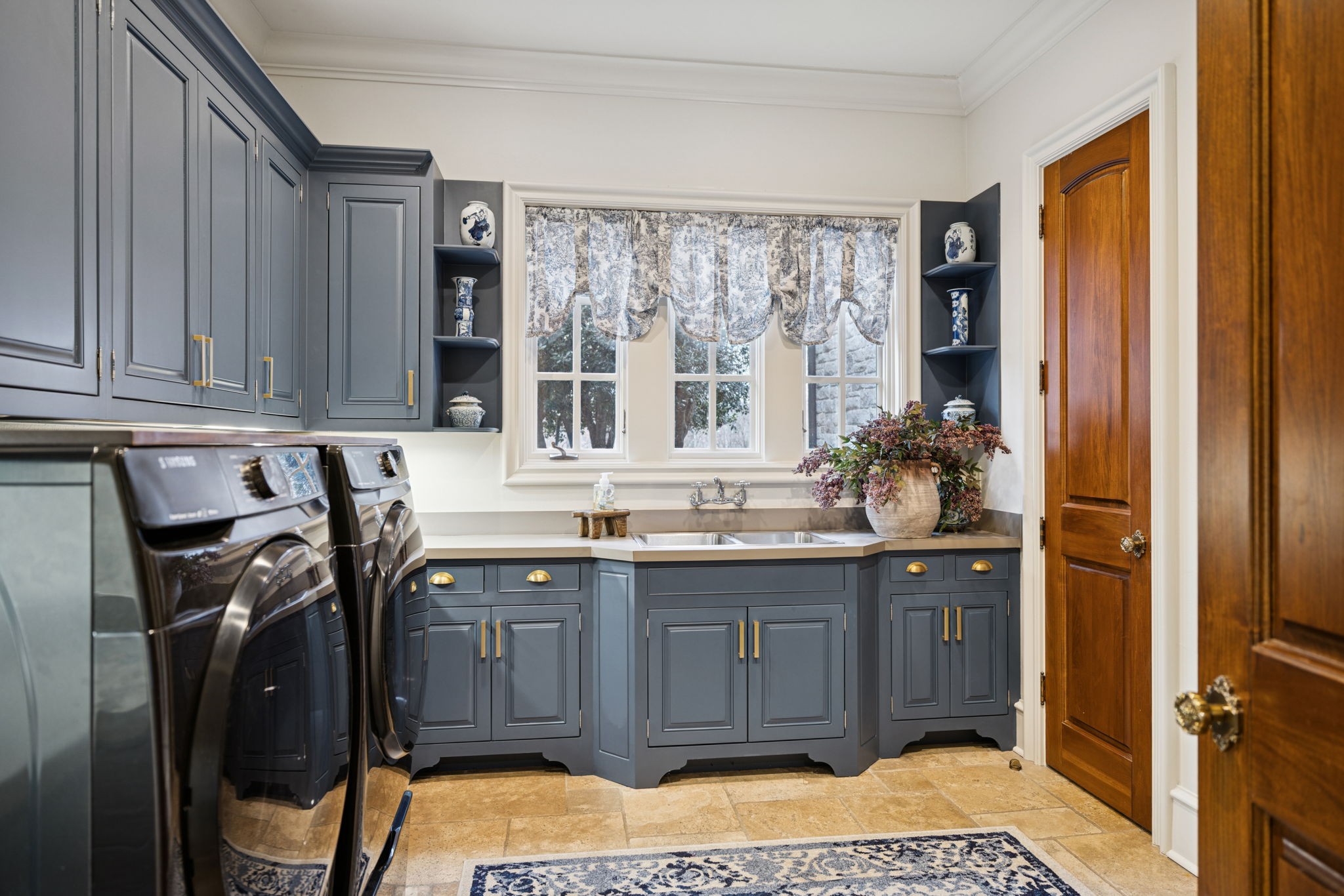 225 Lake Hills Road Tullahoma, TN 37388 - Photo 55 of 82 a kitchen with a sink a window and cabinets
