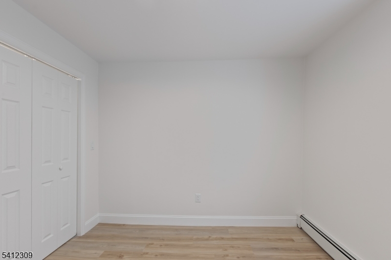 676 Chestnut Street, Unit 1 Kearny, NJ 07032 - Photo 18 of 27 a view of an empty room