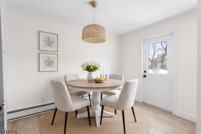 676 Chestnut Street, Unit 1 Kearny, NJ 07032 - Photo 3 of 27 a dining room with furniture and window