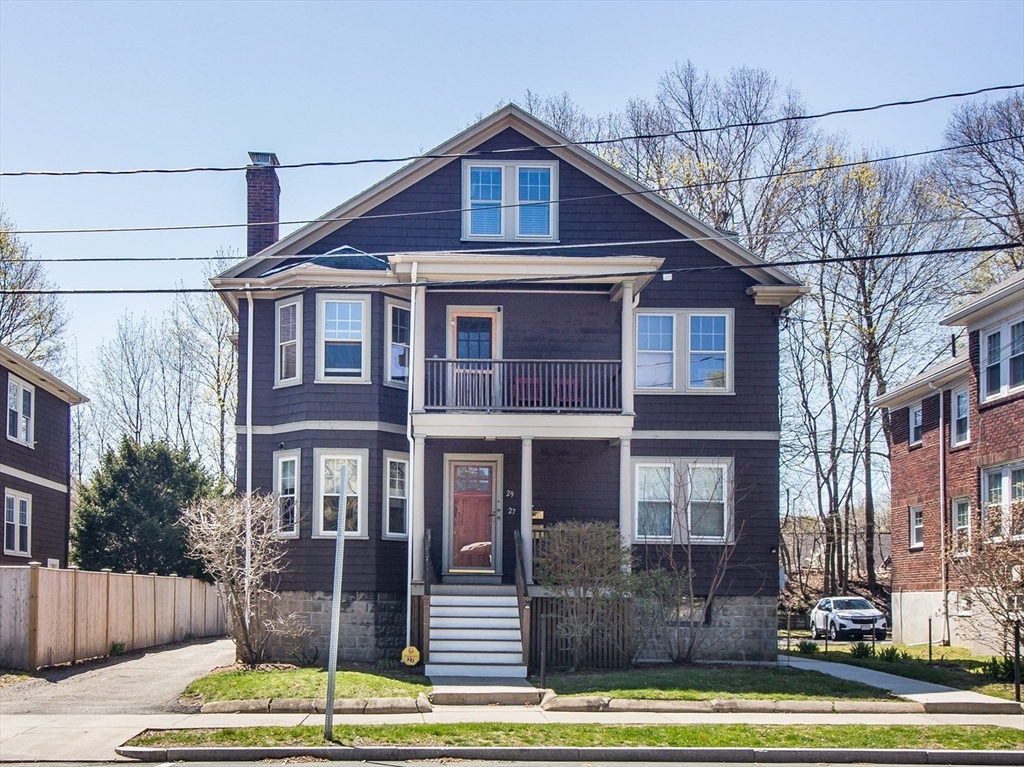 a front view of a house with swimming pool