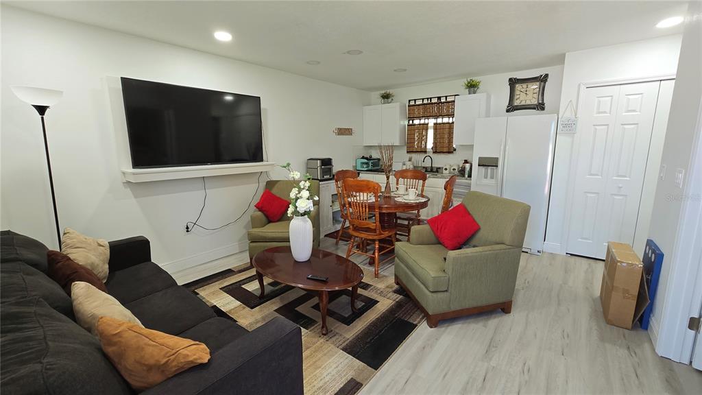 2207 Julianna Court St. Cloud, FL 34769 - Photo 3 of 11 a living room with furniture and a flat screen tv