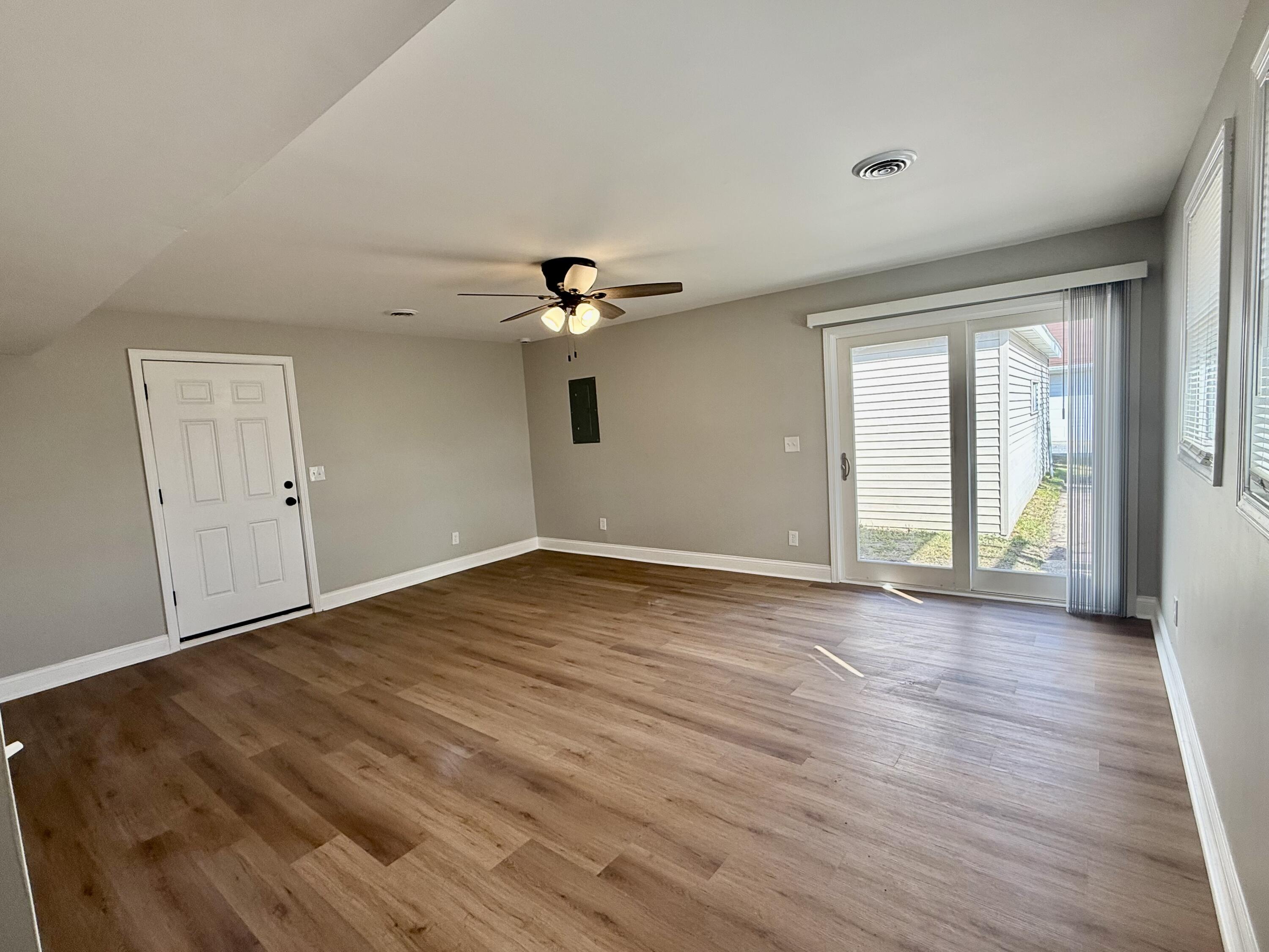 539 North Raymond Street Griffith, IN 46319 - Photo 14 of 24 wooden floor in an empty room with a window