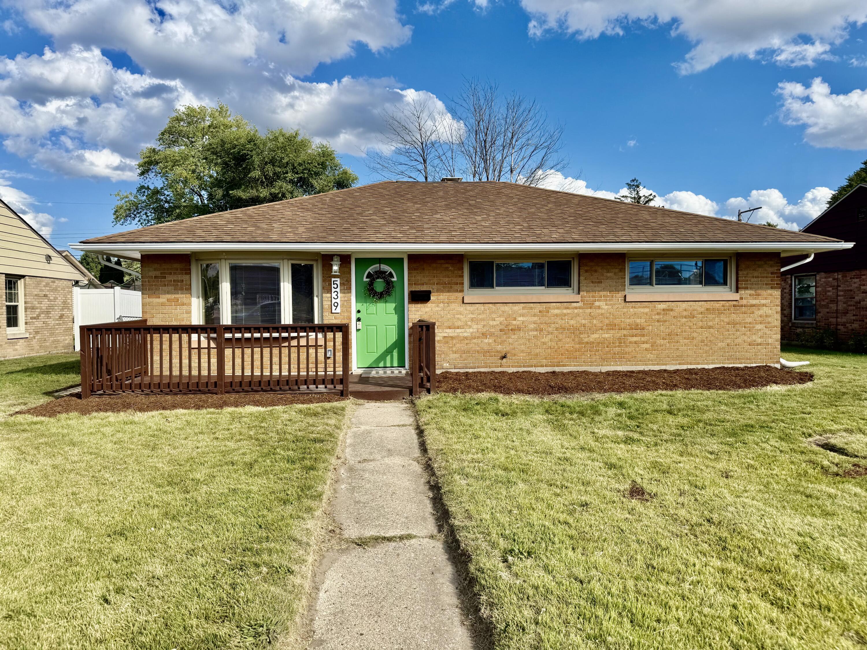 539 North Raymond Street Griffith, IN 46319 - Photo 22 of 24 a front view of a house with yard and green space