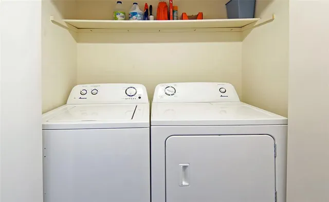 a utility room with dryer and washer