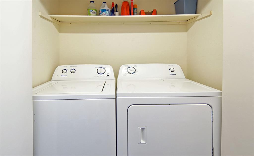 3109 Hells Gate Loop, Unit 59 Strawn, TX 76475 - Photo 17 of 25 a utility room with dryer and washer
