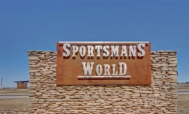 a sign board with parking area