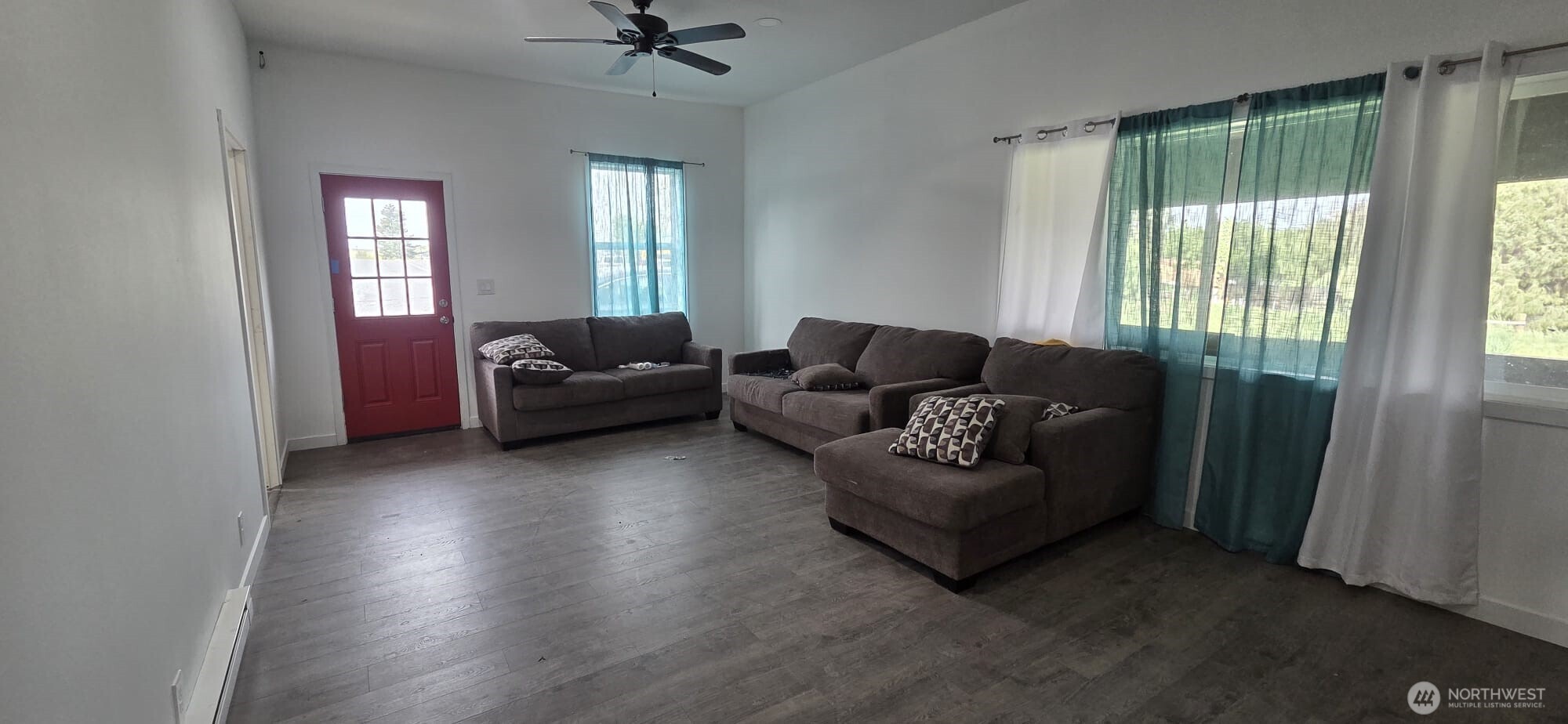 151 1st Avenue Hatton, WA 99344 - Photo 5 of 5 a living room with furniture and a window