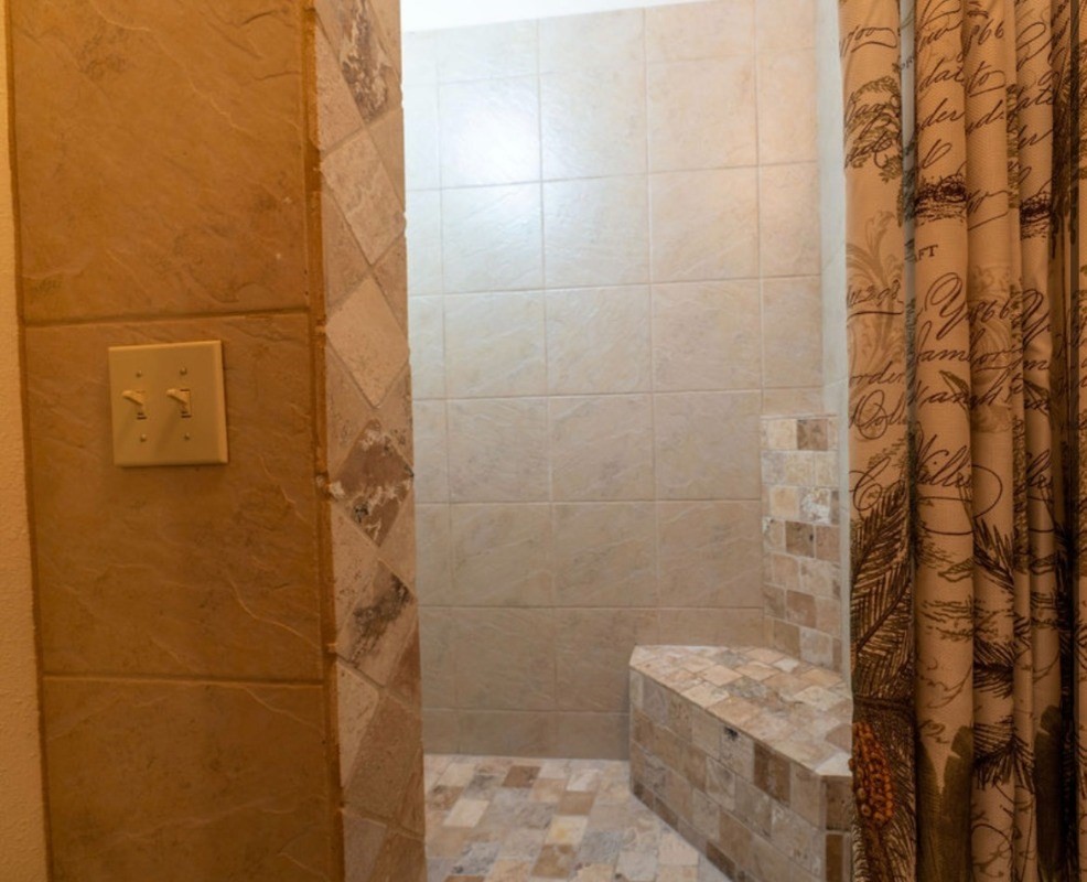 16-1339 Ao Rd Mountain View Mountain View, HI 96771 - Photo 18 of 24 a bathroom with a shower and toilet