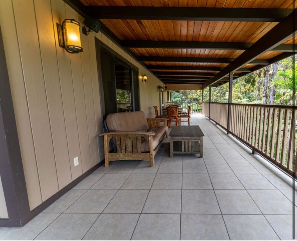 16-1339 Ao Rd Mountain View Mountain View, HI 96771 - Photo 19 of 24 a view of a couches and table in a balcony