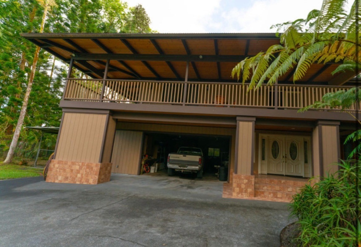 16-1339 Ao Rd Mountain View Mountain View, HI 96771 - Photo 3 of 24 a view of entryway with a yard