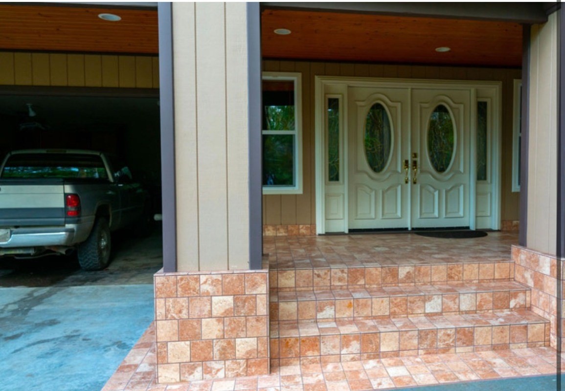 16-1339 Ao Rd Mountain View Mountain View, HI 96771 - Photo 5 of 24 a front view of a house with a yard