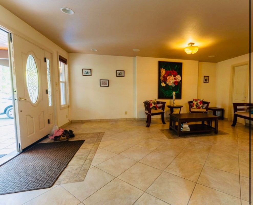 16-1339 Ao Rd Mountain View Mountain View, HI 96771 - Photo 6 of 24 a room with furniture and a large window