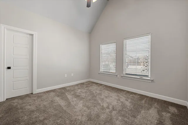 an empty room with windows