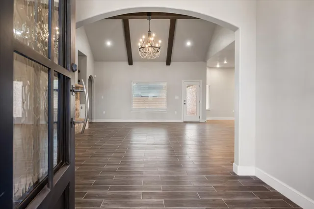 a view of a livingroom with wooden floor