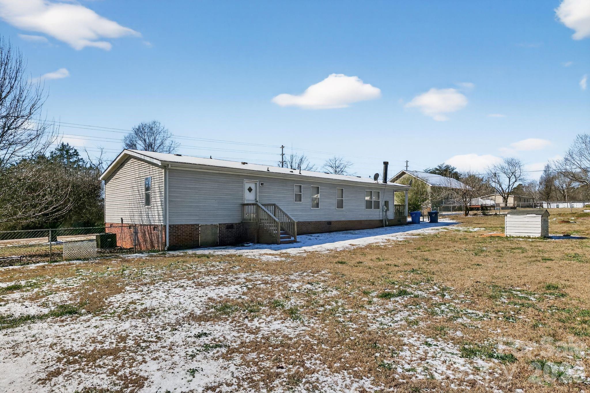 1118 Old Willis School Road Dallas, NC 28034 - Photo 17 of 17 a view of a house with a yard