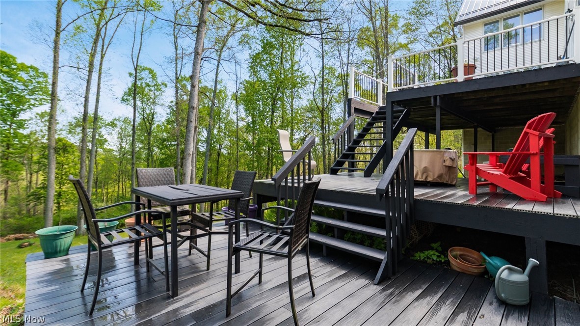 2531 Nicholas Lane Dresden, OH 43821 - Photo 34 of 40 Multi-level outdoor decking featuring rich wood-finish planks, a lower-level patio, and an upper-level balcony