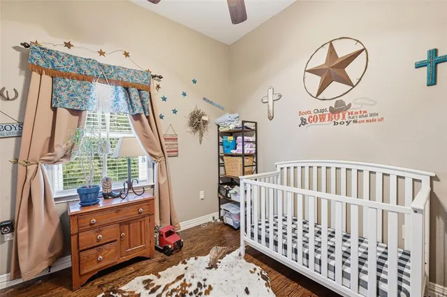 a bedroom with furniture and a window