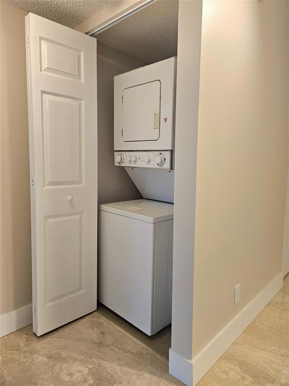 631 Lyons Road, Unit 12105 Coconut Creek, FL 33063 - Photo 11 of 26 a view of washer and dryer