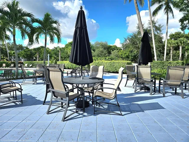 a view of a lake with furniture