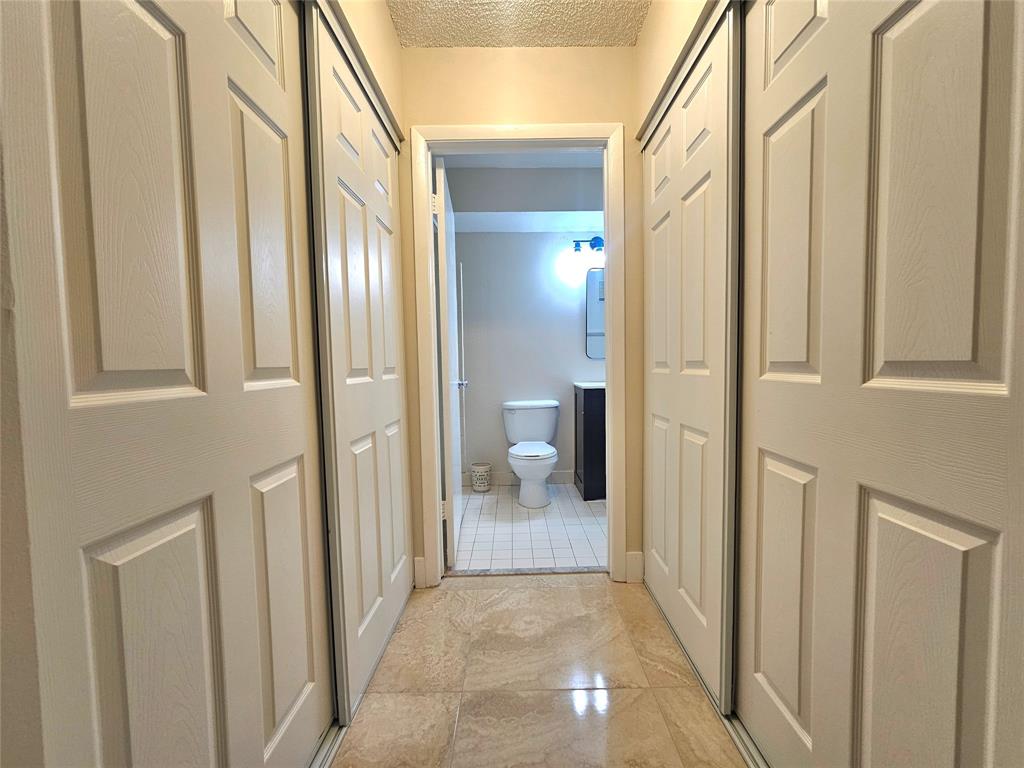 631 Lyons Road, Unit 12105 Coconut Creek, FL 33063 - Photo 9 of 26 a view of a bathroom