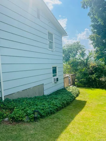 a view of a back yard of the house