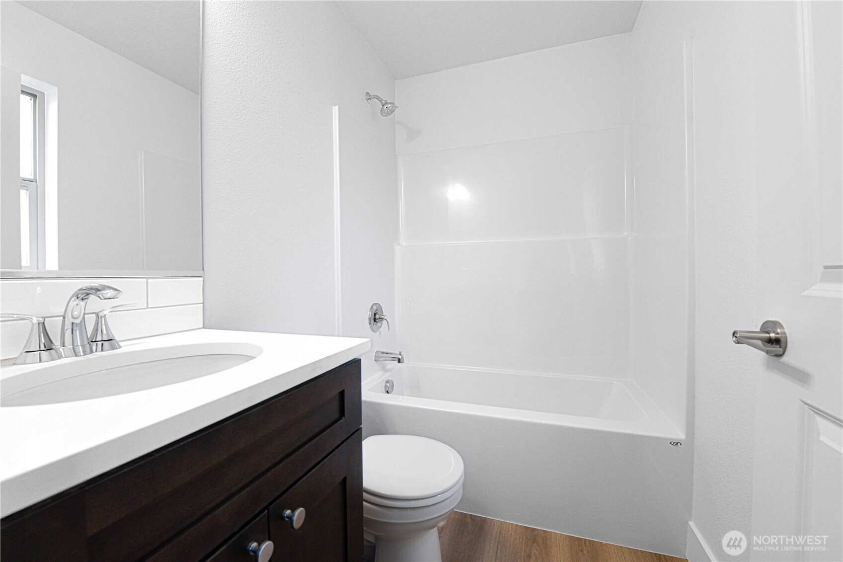 4258 Sandy Street Moses Lake, WA 98837 - Photo 14 of 19 a bathroom with a sink a toilet and a bathtub