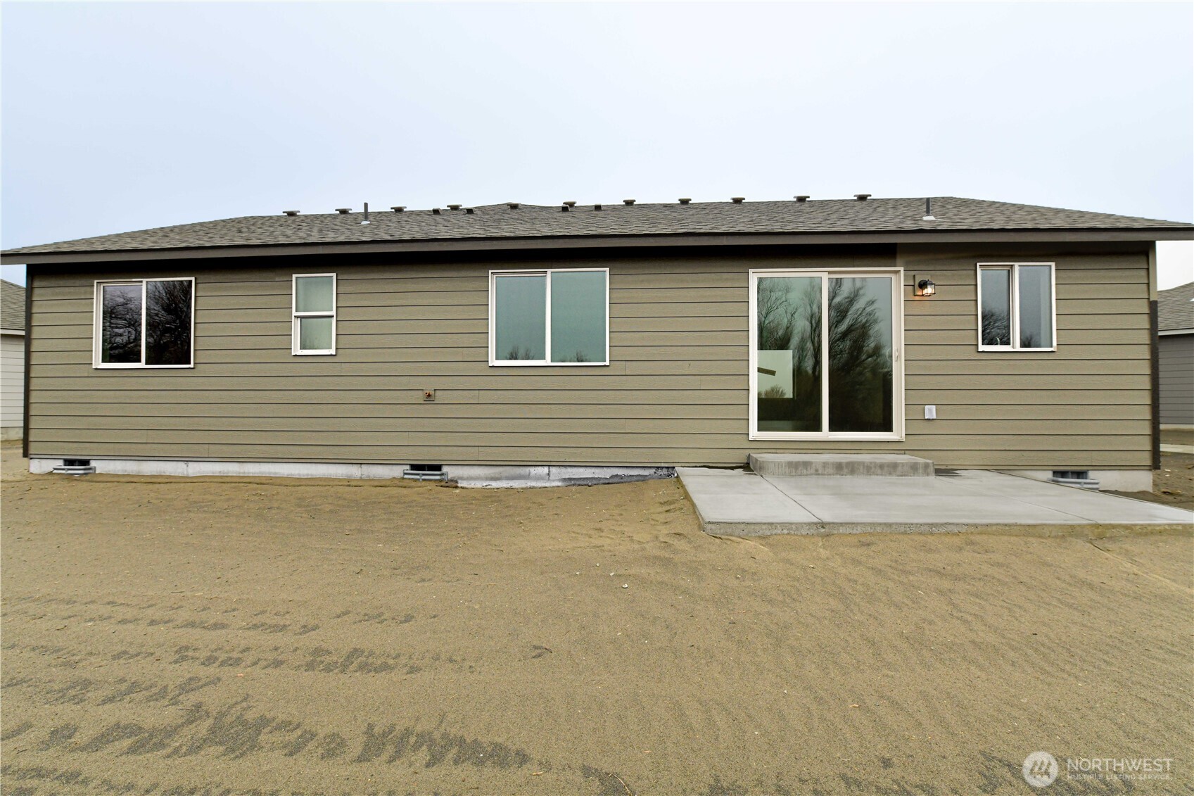 4258 Sandy Street Moses Lake, WA 98837 - Photo 17 of 19 a view of a house with a swimming pool