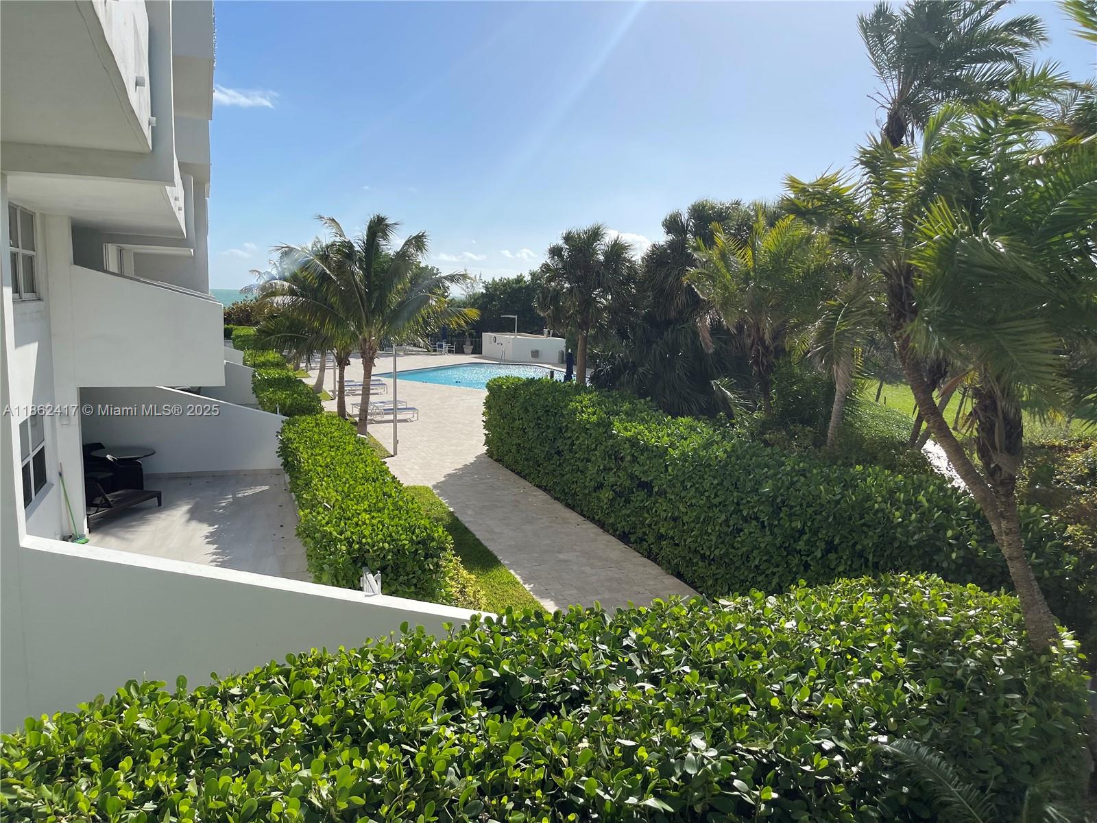 177 Ocean Ln Drive, Unit 209 Key Biscayne, FL 33149 - Photo 13 of 19 a view of a garden with plants