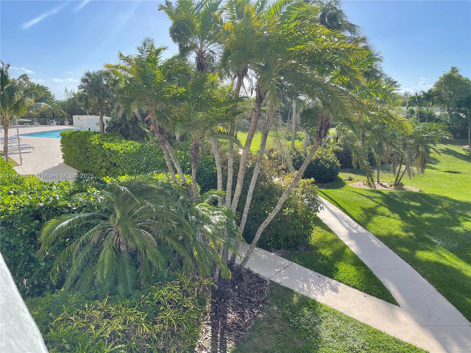 177 Ocean Ln Drive, Unit 209 Key Biscayne, FL 33149 - Photo 14 of 19 a view of a garden