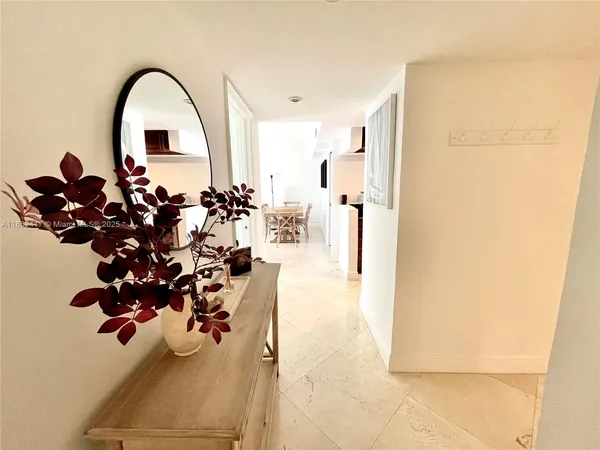 a view of a room with a floor to ceiling window