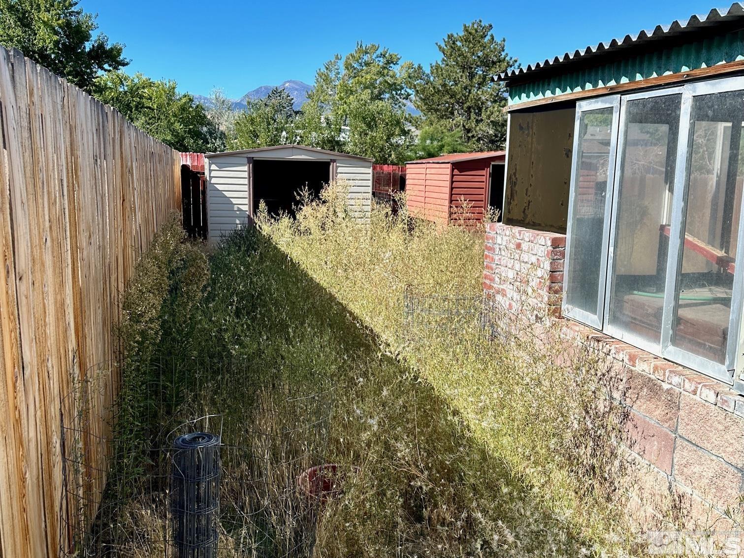 300 Scorpio Circle Reno, NV 89521 - Photo 4 of 16 a backyard of a house with seating space