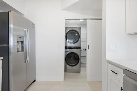 a view of washer and dryer in a utility room