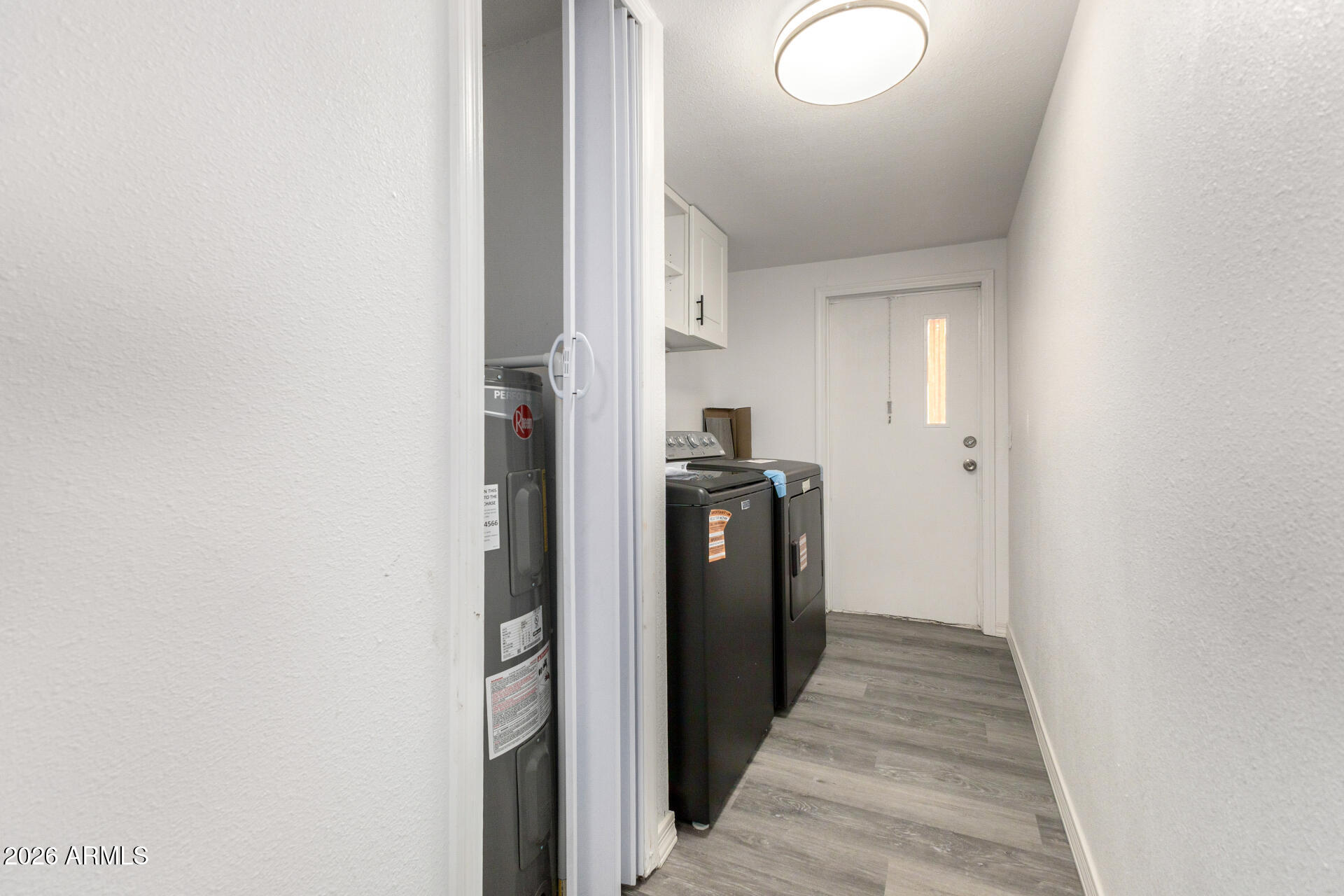 555 West Warner Road, Unit 125 Chandler, AZ 85225 - Photo 27 of 29 a view of a hallway with a white walls